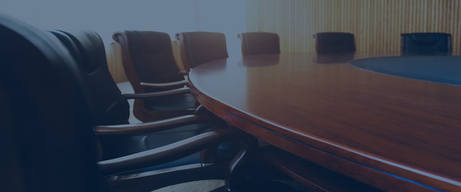 chairs around a boardroom table