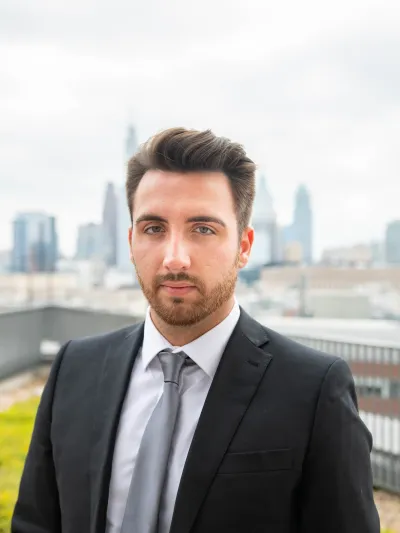 Headshot of Aleksander Chebotarev